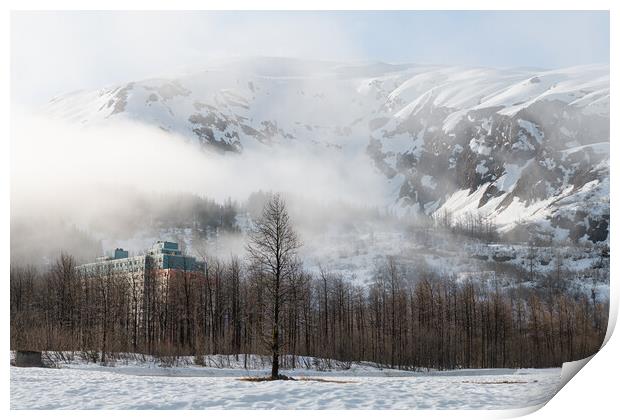 Mist and Fog swirls around Begich Towers Condominium building and the mountains behind, Whittier, Alaska, USA Print by Dave Collins