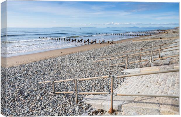 Railings and steps lead down to Barmouth beach Canvas Print by Jason Wells