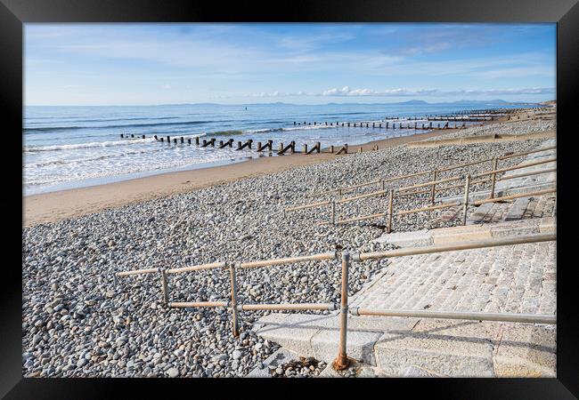Railings and steps lead down to Barmouth beach Framed Print by Jason Wells