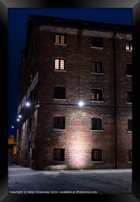 Illuminated Victorian Red Brick Warehouse At The Historic Docks  Framed Print by Peter Greenway