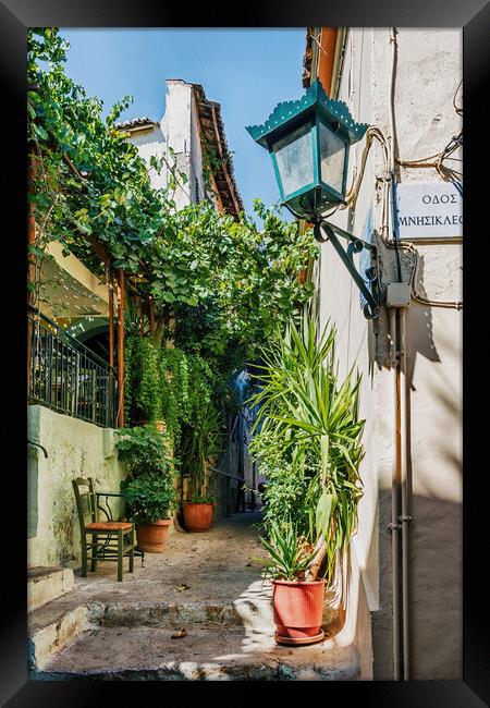 Typical street in the Plaka District Framed Print by Kevin Hellon
