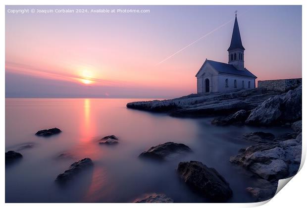 A church stands tall on a rocky shore next to the ocean, with the sunset on the horizon. Print by Joaquin Corbalan