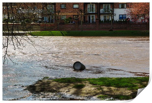 Polluted river with a discarded tire floating on the water's surface, highlighting environmental issues, with urban buildings in the background on a sunny day in York, North Yorkshire, England. Print by Man And Life