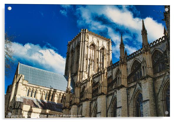 Majestic Gothic cathedral against a blue sky with fluffy clouds, showcasing intricate architecture and historical grandeur in York, North Yorkshire, England. Acrylic by Man And Life