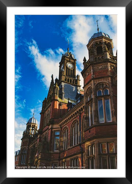 Gothic architecture of a historic building with a prominent clock tower against a blue sky with clouds in York, North Yorkshire, England. Framed Mounted Print by Man And Life