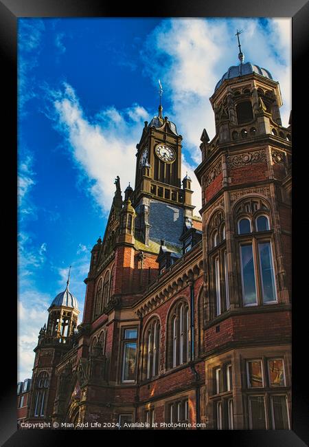 Gothic architecture of a historic building with a prominent clock tower against a blue sky with clouds in York, North Yorkshire, England. Framed Print by Man And Life
