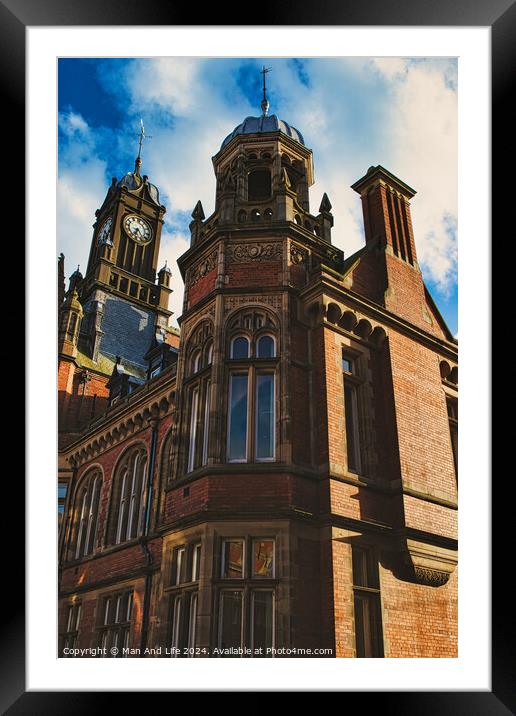 Victorian architecture with a clock tower under a blue sky, showcasing intricate brickwork, historical design, and a sense of timeless elegance in York, North Yorkshire, England. Framed Mounted Print by Man And Life