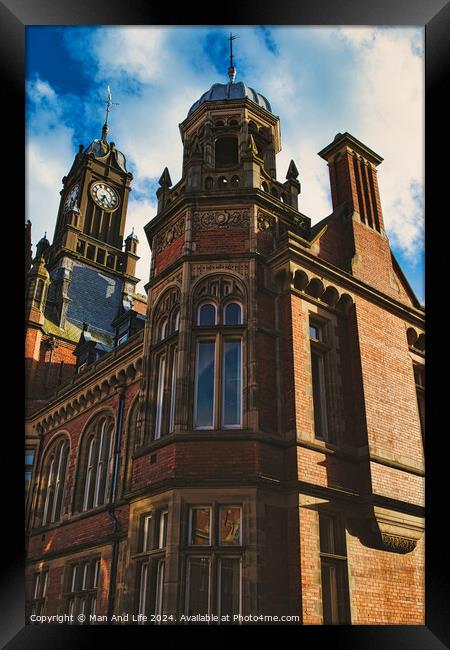 Victorian architecture with a clock tower under a blue sky, showcasing intricate brickwork, historical design, and a sense of timeless elegance in York, North Yorkshire, England. Framed Print by Man And Life
