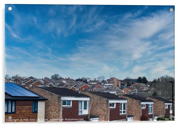 Suburban skyline with rows of houses and solar panels on a roof under a blue sky with wispy clouds in Harrogate, North Yorkshire. Acrylic by Man And Life