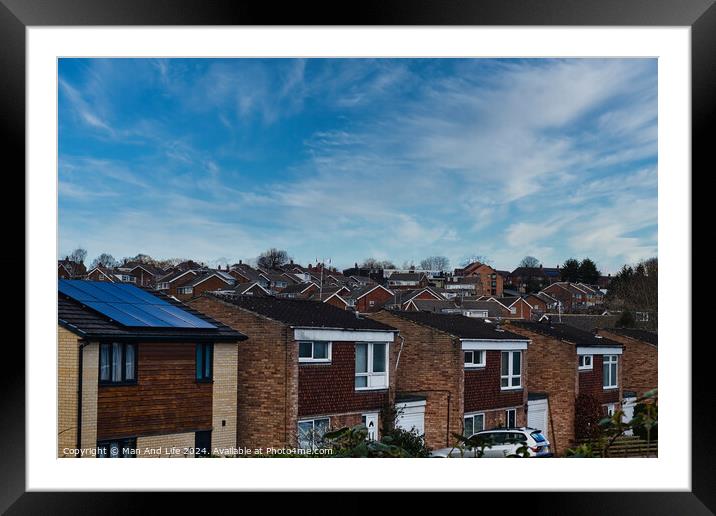 Suburban landscape with rows of British houses, featuring solar panels on roofs under a dynamic blue sky with wispy clouds in Harrogate, North Yorkshire. Framed Mounted Print by Man And Life