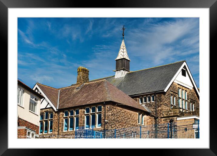 Traditional brick school building with a spire against a blue sky with wispy clouds in Harrogate, North Yorkshire. Framed Mounted Print by Man And Life