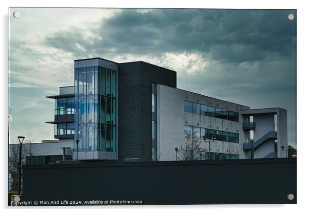 Modern office building against a dramatic cloudy sky, showcasing contemporary architecture with a mix of glass and concrete elements. Acrylic by Man And Life