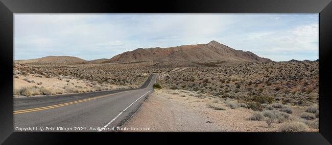 Valley of Fire highway, road into distant mountain Framed Print by Pete Klinger
