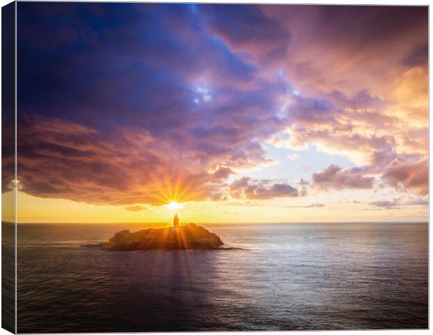 Sunset over Godrevy Lighthouse Canvas Print by Matthew Grey
