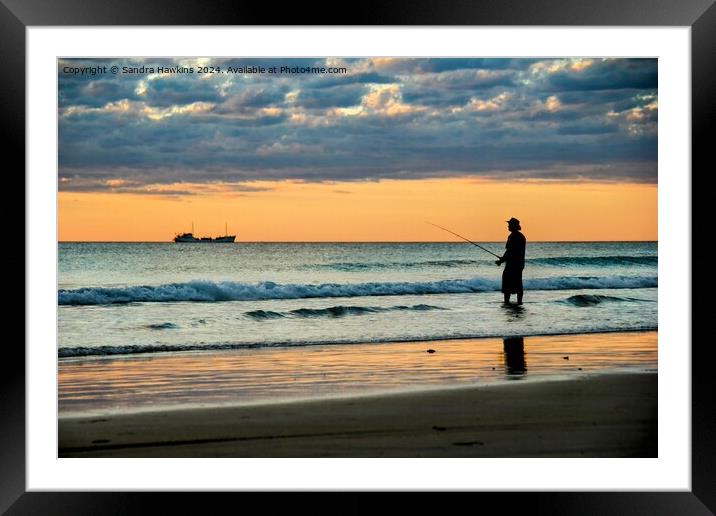 Man fishing in ocean Framed Mounted Print by Sandra  Hawkins 