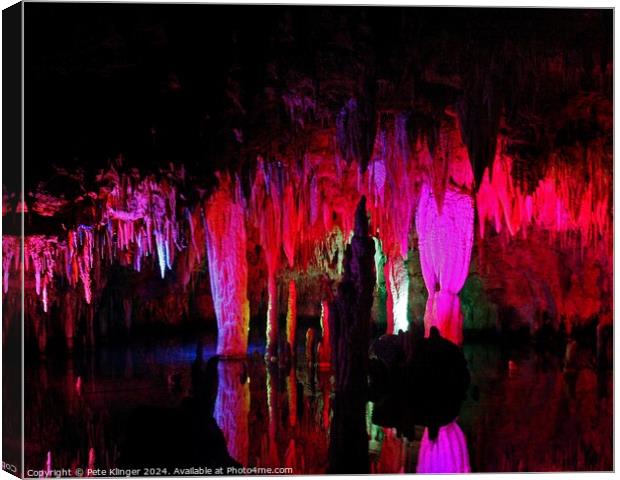 Colorful Cavern Reflecting on water Canvas Print by Pete Klinger