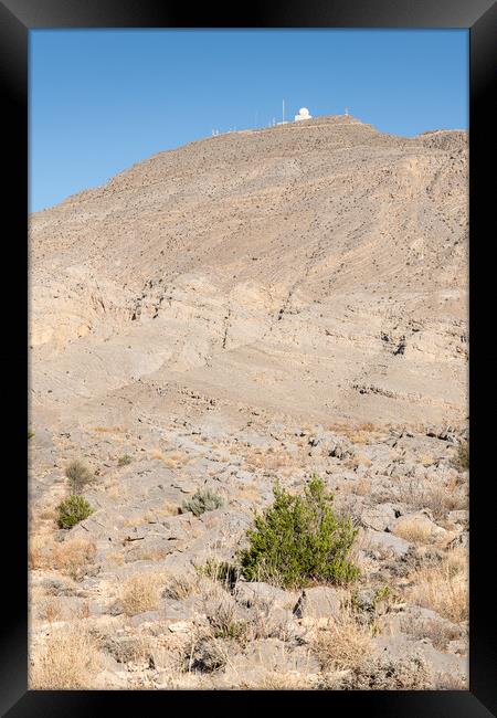 Vertical (portrait orientation) Harim Desert Mountains with a military radar station in Musandam, Oman Framed Print by Dave Collins