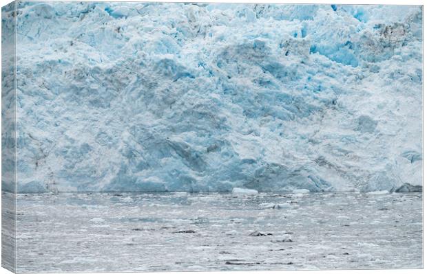 The ice at the front of a glacier, Alaska, USA. Canvas Print by Dave Collins