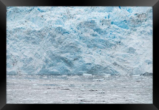 The ice at the front of a glacier, Alaska, USA. Framed Print by Dave Collins