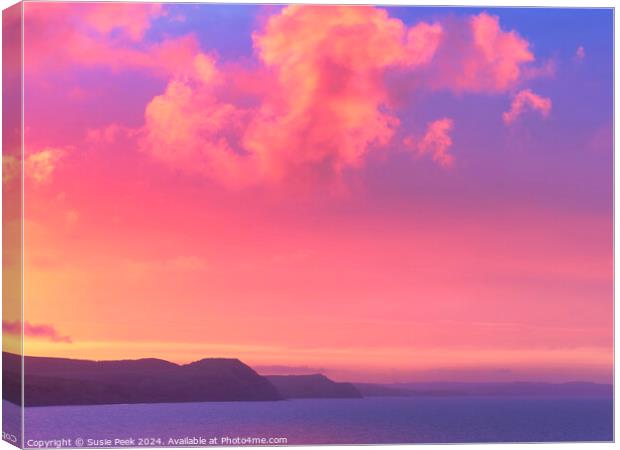 Fiery Dawn Clouds on an April Sunrise over the Jur Canvas Print by Susie Peek