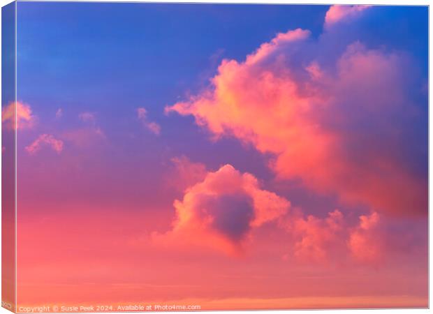 Fiery Dawn Clouds on an April Sunrise Canvas Print by Susie Peek