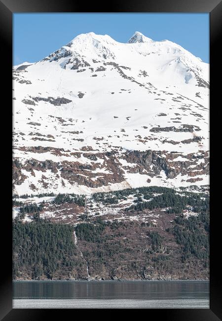Melt water running down the side of a snow covered mountain, Whittier, Alaska, USA Framed Print by Dave Collins