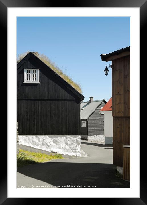 Traditional Faroese Houses with Grass Roofs in Sunlight Framed Mounted Print by FocusArt Flow