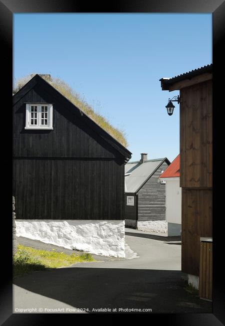 Traditional Faroese Houses with Grass Roofs in Sunlight Framed Print by FocusArt Flow
