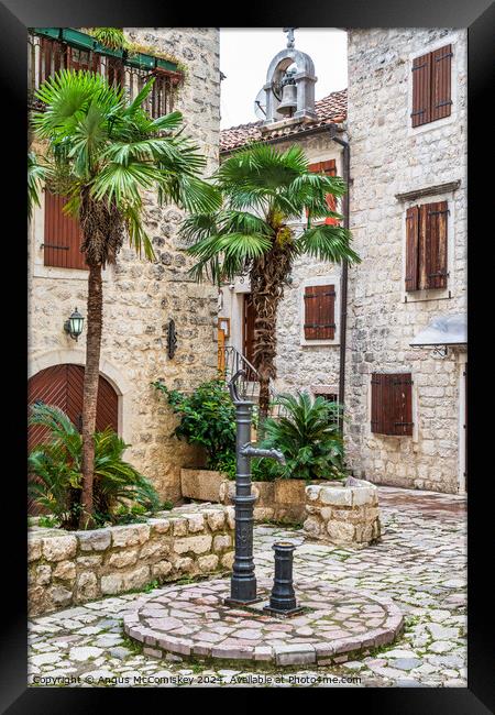 Drinking water tap in old town of Kotor Montenegro Framed Print by Angus McComiskey