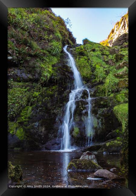 Waterfall over water Framed Print by Amy Smith