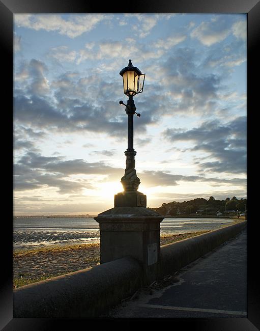 Lamp at Sunset Framed Print by Phil Wareham
