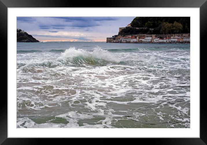 A wave breaks in the bay of San Sebastian, Spain Framed Mounted Print by Lensw0rld 