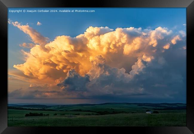 A massive, dramatic cloud looming in the sky, creating a striking scene. Framed Print by Joaquin Corbalan