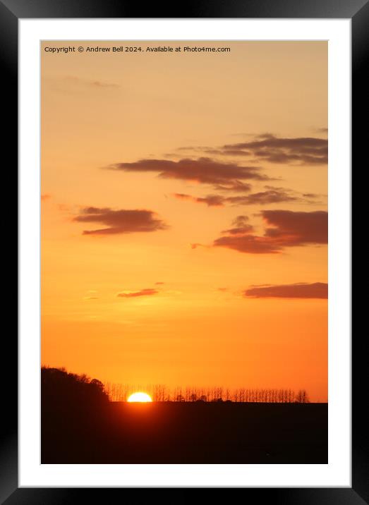 Clouds and silhouettes sunset Framed Mounted Print by Andrew Bell