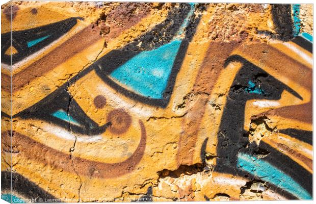 Detail of graffiti painted on the wall of a ruin in Portugal Canvas Print by Laurent Renault