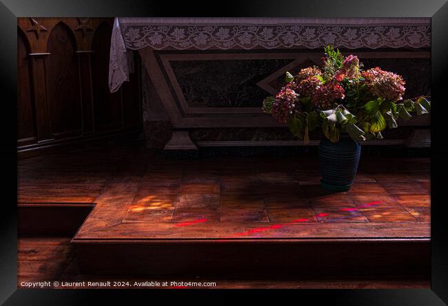 Flowers at the foot of the church altar. Photography taken in Fr Framed Print by Laurent Renault