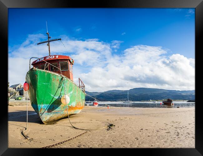 Fishing boat at low tide Framed Print by Jason Wells