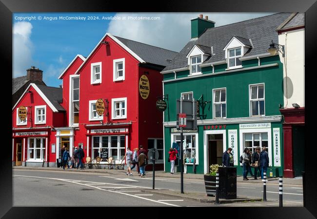Colourful shopfronts in Dingle Town, County Kerry Framed Print by Angus McComiskey