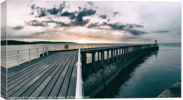 A Straight Shot To The Sun - Whitby Pier, Yorkshire, UK Canvas Print by Martyn Lowes