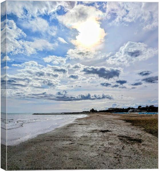 Sun in clouds over beach Canvas Print by Robert Galvin-Oliphant