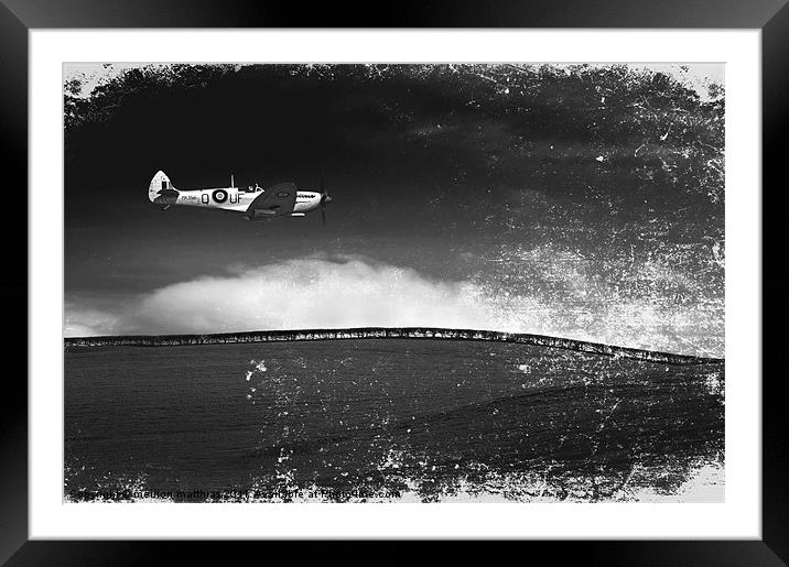 low flying silver spitfire Framed Mounted Print by meirion matthias