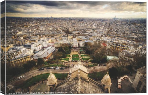 Cityscape of Paris from The Basilica of the Sacred Heart of Paris, Montmartre Canvas Print by Justo II Gayad