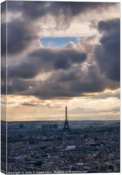 Cloudy day at Paris France Canvas Print by Justo II Gayad