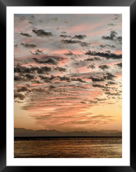 Dramatic clouds over sea Framed Mounted Print by Robert Galvin-Oliphant
