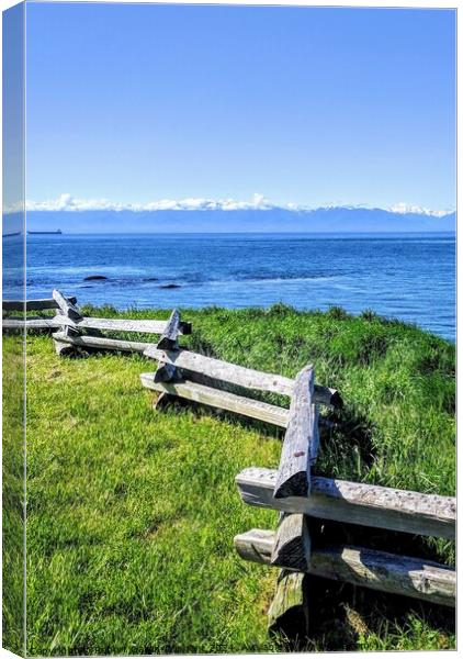 Wooden fence by the Pacific Ocean  Canvas Print by Robert Galvin-Oliphant