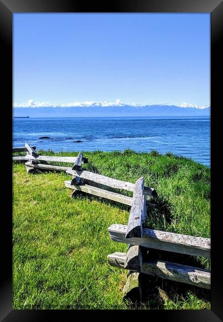 Wooden fence by the Pacific Ocean  Framed Print by Robert Galvin-Oliphant