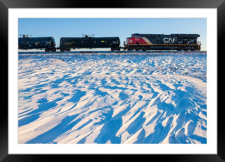 Locomotive Pulling Tanker Cars Passing Snow Drift Patterns Framed Mounted Print by Dave Reede