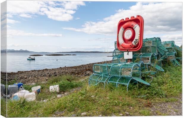 Lobster - crab pots stacked up around a life ring in Glenuig on the Sound of Arisaig, Highlands, Scotland Canvas Print by Dave Collins