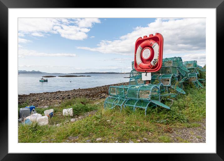 Lobster - crab pots stacked up around a life ring in Glenuig on the Sound of Arisaig, Highlands, Scotland Framed Mounted Print by Dave Collins