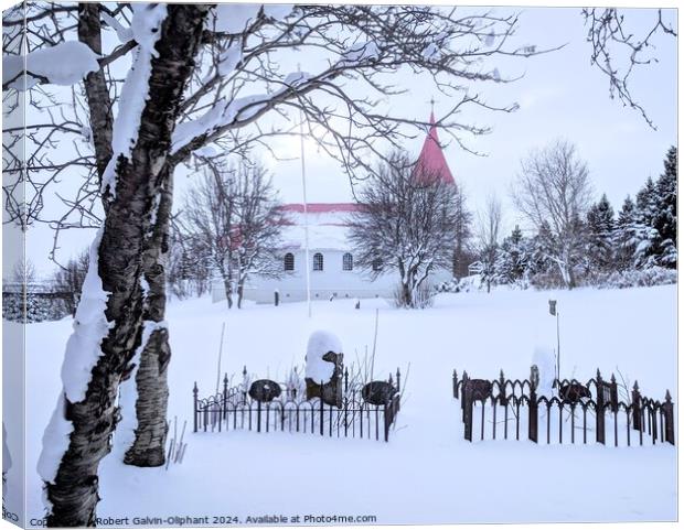 Church and graveyard in snow  Canvas Print by Robert Galvin-Oliphant